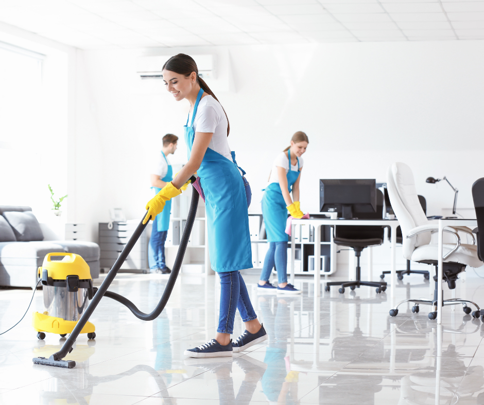 Commercial cleaners cleaning an office